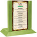 A lime wood Menu Solutions table tent with a menu insert on a table.