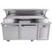 A Traulsen stainless steel refrigerated pizza prep table with 2 doors.