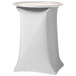 A white rectangular tray stand with a white Snap Drape contour cover.