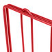 A Metro red metal wire shelf divider with a handle.