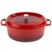 A red GET Heiss oval dutch oven with a lid.