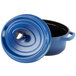 A cobalt blue oval Dutch oven with a lid.