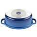 A cobalt blue and white cast aluminum oval Dutch oven with a lid.