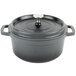 A gray enamel coated cast aluminum round Dutch oven with a lid.