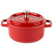 A red and white enamel coated cast aluminum round bistro pot with a lid.