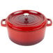 A red round GET Heiss Dutch oven with a lid.