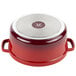 A red and silver GET Heiss round dutch oven with a lid.