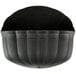 A black curved bowl with a lid on it.