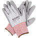 A pair of Cordova Machinist Cut Resistant Work Gloves with gray polyurethane palms.