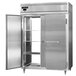 A stainless steel Continental pass-through refrigerator with a door open.