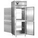 A stainless steel Continental pass-through refrigerator with a metal door and white window.