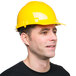 A man wearing a yellow Cordova Duo hard hat.