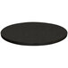 A Tablecraft translucent black round aluminum table cover with a random swirl pattern on a table.