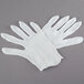 A pair of white Cordova Lightweight Cotton Gloves.