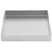 A Tablecraft stainless steel square bowl with straight sides on a white surface.