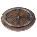 A mahogany circular turntable with metal spokes.