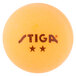 A pack of 2-star orange Stiga ping pong balls.