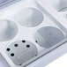 An Avantco white ice cream dipping cabinet with two holes in the flat sneeze guard.