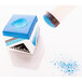 A blue and white box of Mizerak Pool Cue Chalk with blue cubes inside.