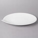 A white Villeroy & Boch porcelain oval platter with a leaf shaped edge.