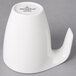 A white ceramic tea cup with a handle.