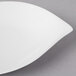 A white Villeroy & Boch porcelain plate on a gray surface.