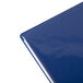 A close-up of a dark blue Menu Solutions folder.