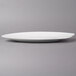 A white Villeroy & Boch porcelain oval platter with a small leaf design.