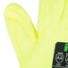 A close up of a pair of Cordova Hi-Vis yellow gloves with a yellow polyurethane palm.