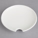 A white Villeroy & Boch porcelain plate with a hole in the middle.