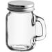 An Acopa mini mason jar with a metal lid.