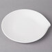 A white Villeroy & Boch porcelain flat plate with a small hole in the middle.