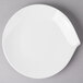 A white Villeroy & Boch porcelain flat plate with a small hole in the middle.