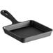 A black square Valor cast iron pan with a handle.