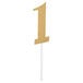 A gold glittery number one cake topper on a white stick.