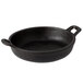A Valor pre-seasoned black cast iron round casserole dish with handles.