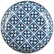 An Arcoroc Candour Azure porcelain deep soup plate with a blue and white pattern.