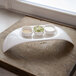 A white Villeroy & Boch Urban Nature fruit bowl with grains in it.