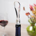 A Tablecraft wine aerator attached to a wine bottle.