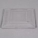 A clear square glass plate with a square edge.