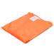 A folded Cordova orange high visibility safety vest on a white background.