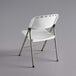 A white folding chair with a gray metal frame.