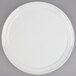 An American Metalcraft white ceramic pizza serving tray with a round rim.