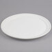 An American Metalcraft white ceramic pizza serving tray on a gray surface.