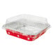 A red and white Durable Packaging square foil container with a clear lid.