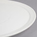 An American Metalcraft white ceramic pizza serving tray with a rim.
