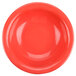 A close-up of a red Thunder Group melamine soup bowl.