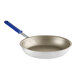 A Vollrath Wear-Ever aluminum non-stick fry pan with a blue and silver Cool Handle.