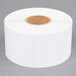 A roll of white Tor Rey thermal labels.