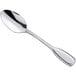 An Acopa Saxton stainless steel teaspoon with a silver handle and spoon.